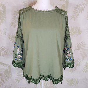 Floral embroidered scalloped sleeve top with crochet lace details